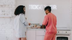 A romantic couple in the kitchen [Image: Shvets Production]