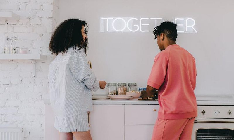 A romantic couple in the kitchen [Image: Shvets Production]