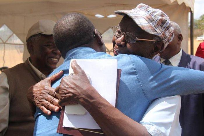 File image of Prof Mbiti hugging former CJ willy Mutunga