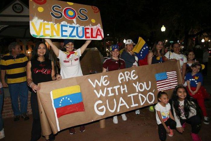 Venezuelans living in America watch crisis back home with hope and caution