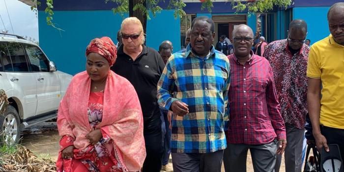 Raila Odinga and Mbishi Mboko at Likoni Ferry tragedy where he was briefed on the progress of the mission to retrieve the bodies of the victims