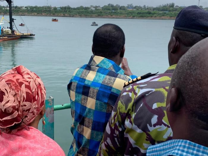 Raila Odinga and Mbishi Mboko at Likoni Ferry tragedy where he was briefed on the progress of the mission to retrieve the bodies of the victims