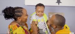 Kabi and Milly WaJesus reveal their son's face for the first time (Courtesy/YouTube)