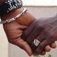 Men holding hands (Image DW)