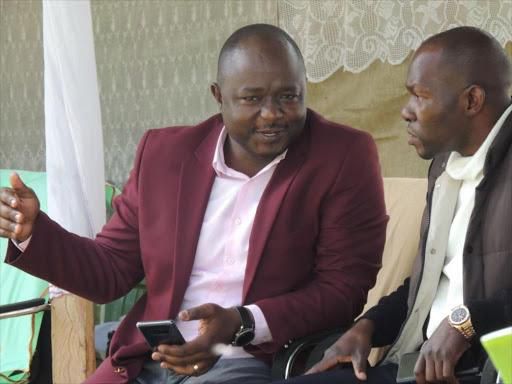 Uriri MP Mark Nyamita (L) and Saboti MP Caleb Amisi at a past event