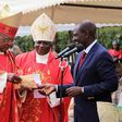 File image of DP William Ruto, John Cardinal Njue (left) during a fundraiser at a Catholic Church