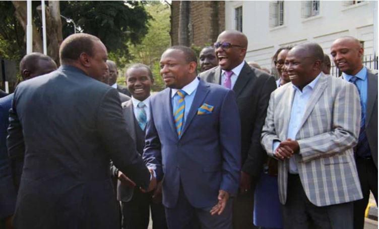 Mike Sonko greeting Prsident Uhuru Kenyatta as his former deputy Polycarp Igathe and other dignitaries look on