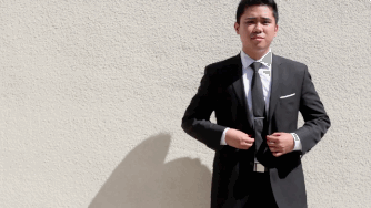 Buttoning jacket gif (WiffleGif)