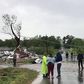 Storms strike south, killing two children