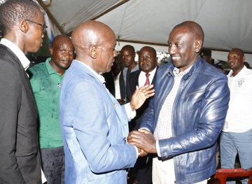 DP William Ruto with Politician Bonny Khalwale at the Requiem Mass of Mama Adelaide