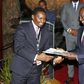 File image of Mwangi Kiunjuri receiving a report from DP Ruto during the opening of the comprehensive agriculture development programme at Safari Park hotel in Nairobi on June 12, 2019.