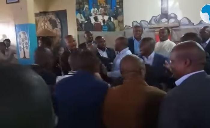 A screen-grab image of the drama as Ndindi Nyoro and Maina Kamanda fought in church, paralyzing service [Video]