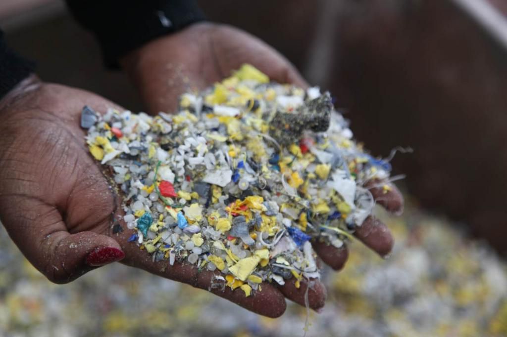 Meet the environmental scientist who uses throw away plastics to build homes