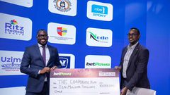 Presenting the cheque at the press conference was betPawa’s license partner, Allan Tumushabe.