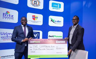 Presenting the cheque at the press conference was betPawa’s license partner, Allan Tumushabe.