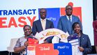 Julius Kakeeto, MD of Pearl Bank (back left), and Mumba Kenneth Kalifungwa, Managing Director of Stanbic Bank Uganda (back right), pose during the launch of the Wendi by Pearl Bank and FlexiPay partnership on Thursday