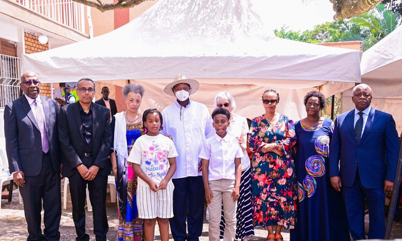 President Yoweri Museveni with the Late George Kanyeihamba's family