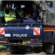 File image of a police vehicle ferrying suspects