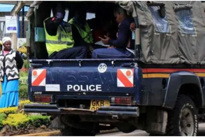 File image of a police vehicle ferrying suspects