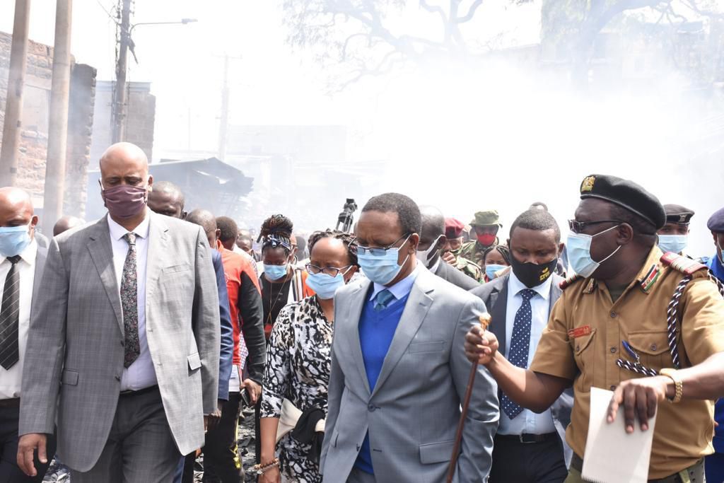 Interior PS Karanja Kibicho with traders from Gikomba Market hours after inferno destroyed goods of unknown value on June 25, 2020