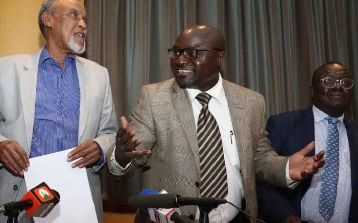 BBI Chairman Yusuf Haji (left), BBI member Adams Oloo (centre). BBI taskforce makes final announcement on much-awaited Report