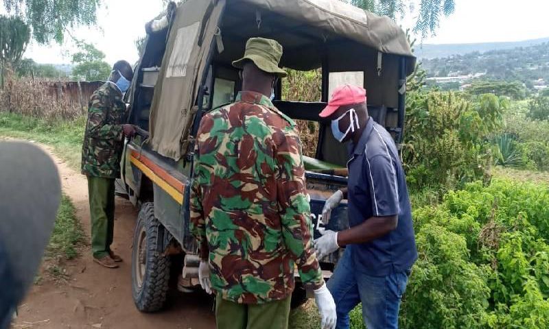 Police remove body of 82-year-old granny who was murdered by her son Edwin Losepish in Maralal, Samburu