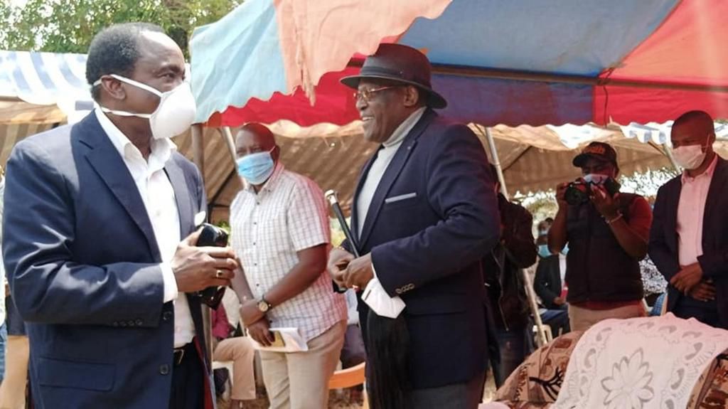 Former Vice President Kalonzo Musyoka with former Machakos Senator Johnson Muthama during the burial of Samuel Mutuku