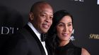 Dr Dre, left, pictured with Nicole Young in 2018