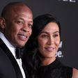 Dr Dre, left, pictured with Nicole Young in 2018