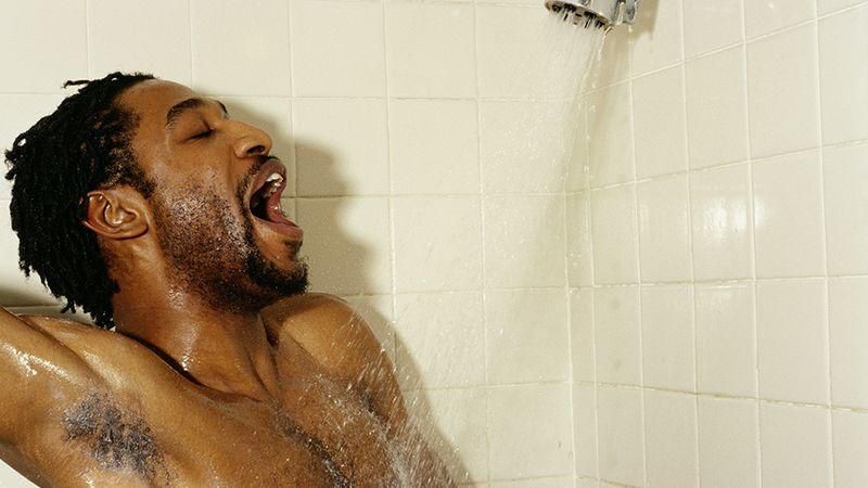 black man showering