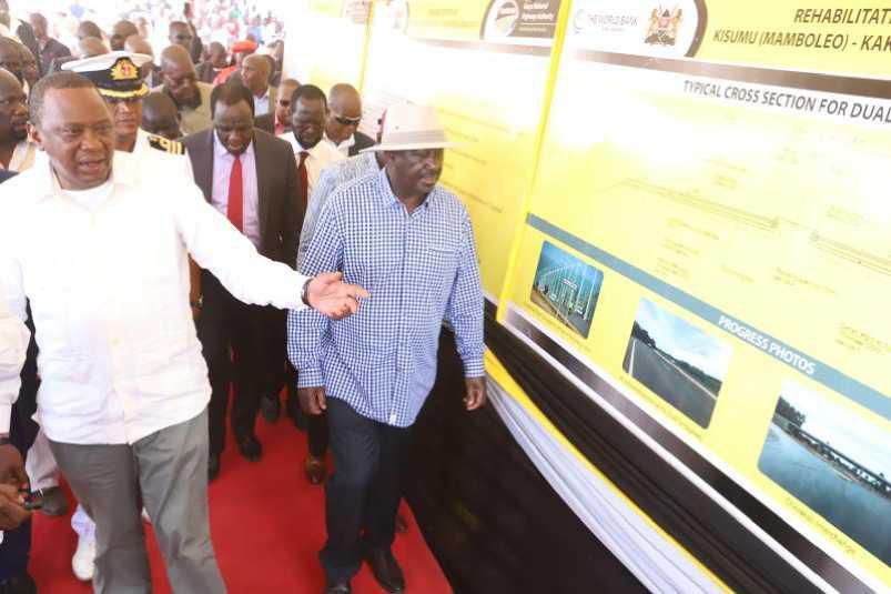 File image of President Uhuru Kenyatta with opposition leader Raila Odinga while commissioning the construction of Kisumu -Kakamega road in 2018