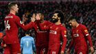 22 reasons to cheer: Mohamed Salah (2nd right) and Jordan Henderson (left) scored in Liverpool's victory over Southampton