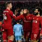 22 reasons to cheer: Mohamed Salah (2nd right) and Jordan Henderson (left) scored in Liverpool's victory over Southampton