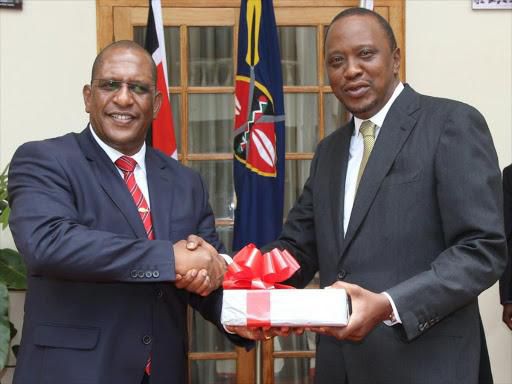President Uhuru Kenyatta (right) and Environment CS Keriako Tobiko