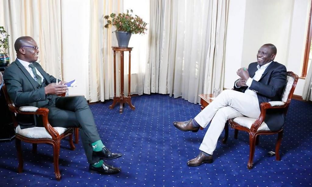 Deputy President William Ruto and Citizen TV's Joe Ageyo