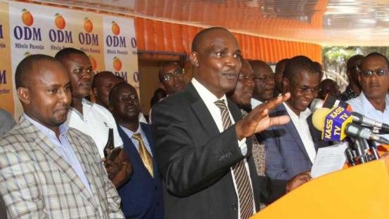 Junet Mohamed (left) and John Mbadi (centre) during a past press conference