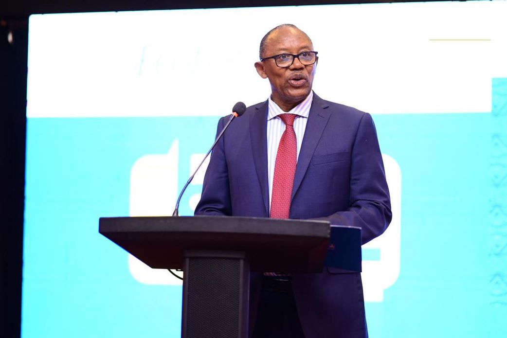 Ecobank Board Chairman Richard Munyaneza addressing the customers at the event.