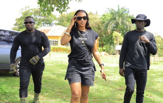Spice Diana with her security detail