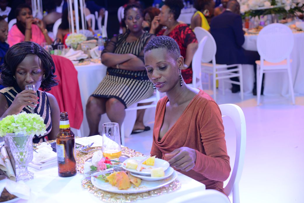 Guests having dinner at the wedding reception