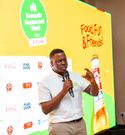 Isac Langoli the Pearl Guide Project Lead-Kampala Restaurant Week,addessing guests during the menu tatsing at Aldea Restaurant and Lounge
