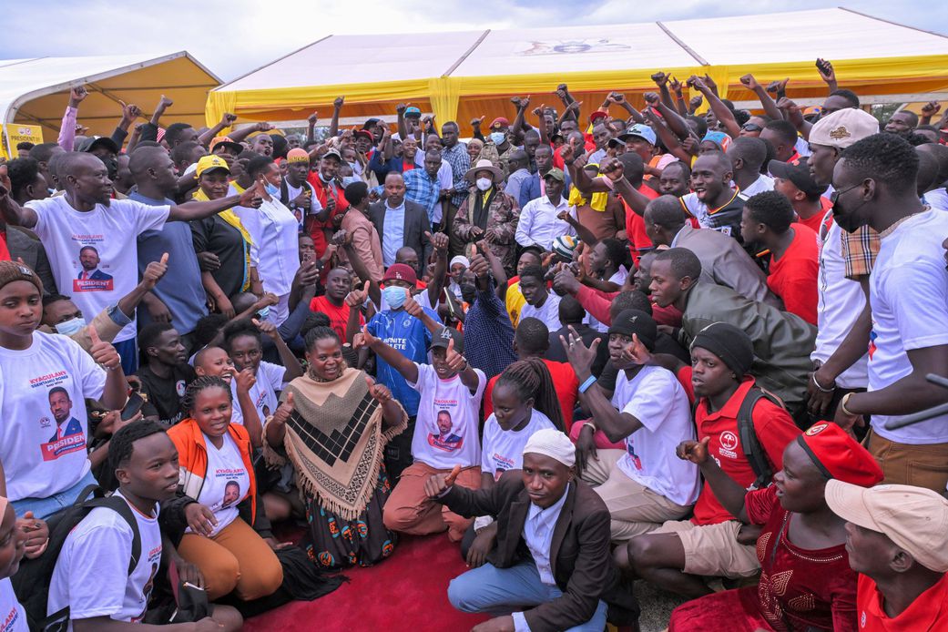 President Museveni poses with the converts