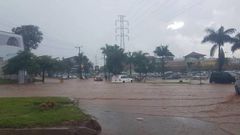 Police have urged the public to avoid unnecessary movement during heavy rain and advised boda boda riders to wait for water levels to subside before attempting to cross flooded roads.