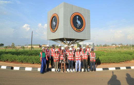 EfD-Mak Team and Inclusive Green Economy (IGE) Fellows pose for a group photo at the Kiira Motors Corporation (KMC) plant in Jinja