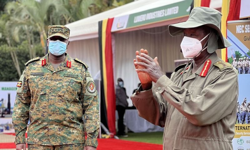 President Yoweri Museveni and Gen Muhoozi Kainerugaba at the Defense Expo in Kampala on Tuesday