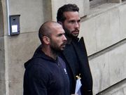Andrew Tate (left) and his brother Tristan leave court after losing their appeal to be released from jail in Romania.Andreea Campeanu/Getty Images