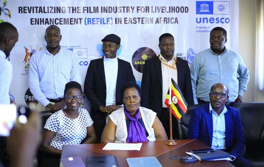 Dr. Ruth Tusasirwe Muguta, Principal Social Development Officer at the Ministry with some of the players in the film industry  addressing press on Thursday