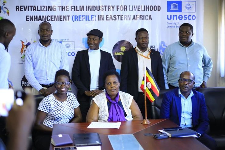 Dr. Ruth Tusasirwe Muguta, Principal Social Development Officer at the Ministry with some of the players in the film industry  addressing press on Thursday