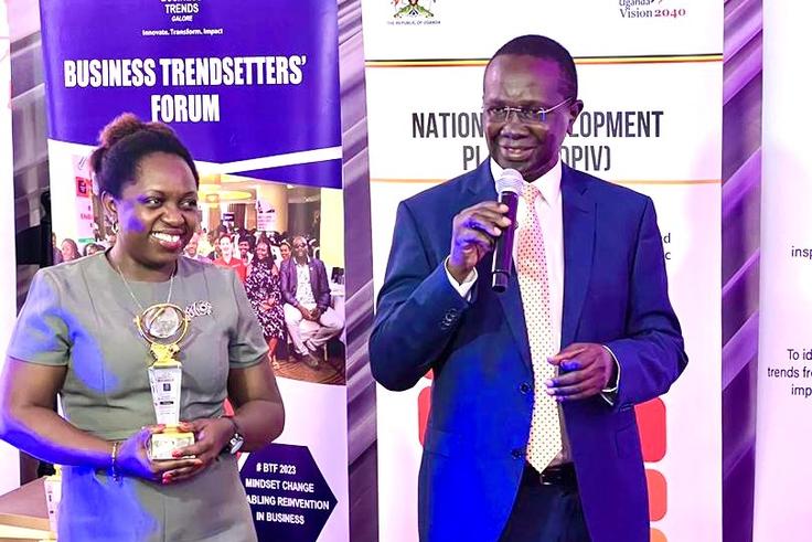 Hon Daudi Migereko giving a speech after recieving his award as a trend setter for his work in setting up FINCA Uganda