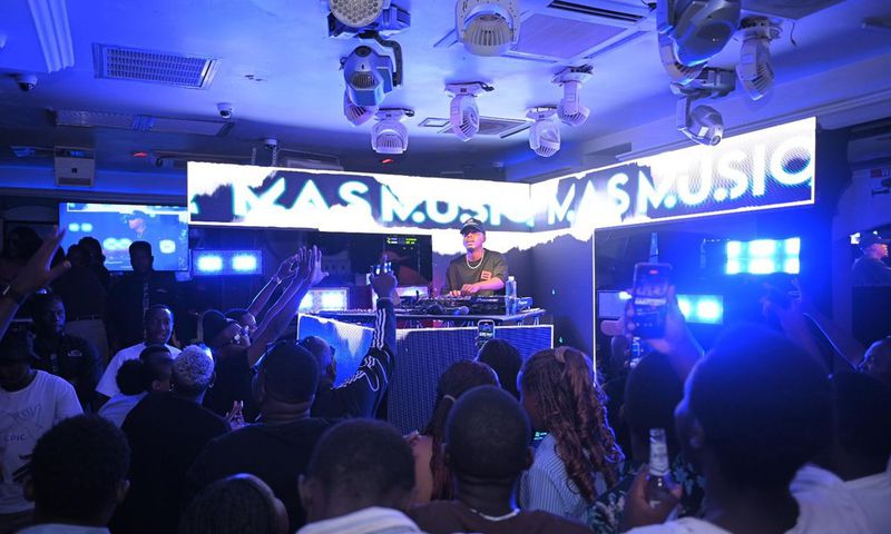 Revellers cheer on as Mas Musiq does his thing