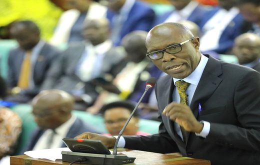 Dr. Jospeh Ruyonga, the Chairperson of the Committee on Health, presenting his statement on the forced HIV-AIDS testing